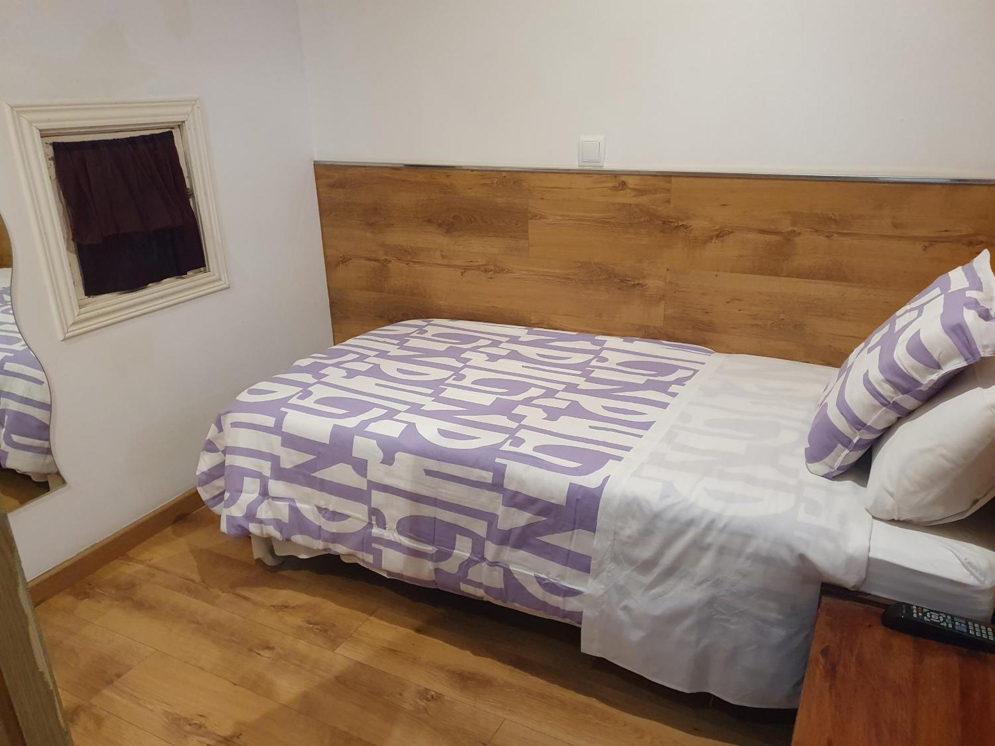 Quarto Individual Económico com Casa de Banho Partilhada